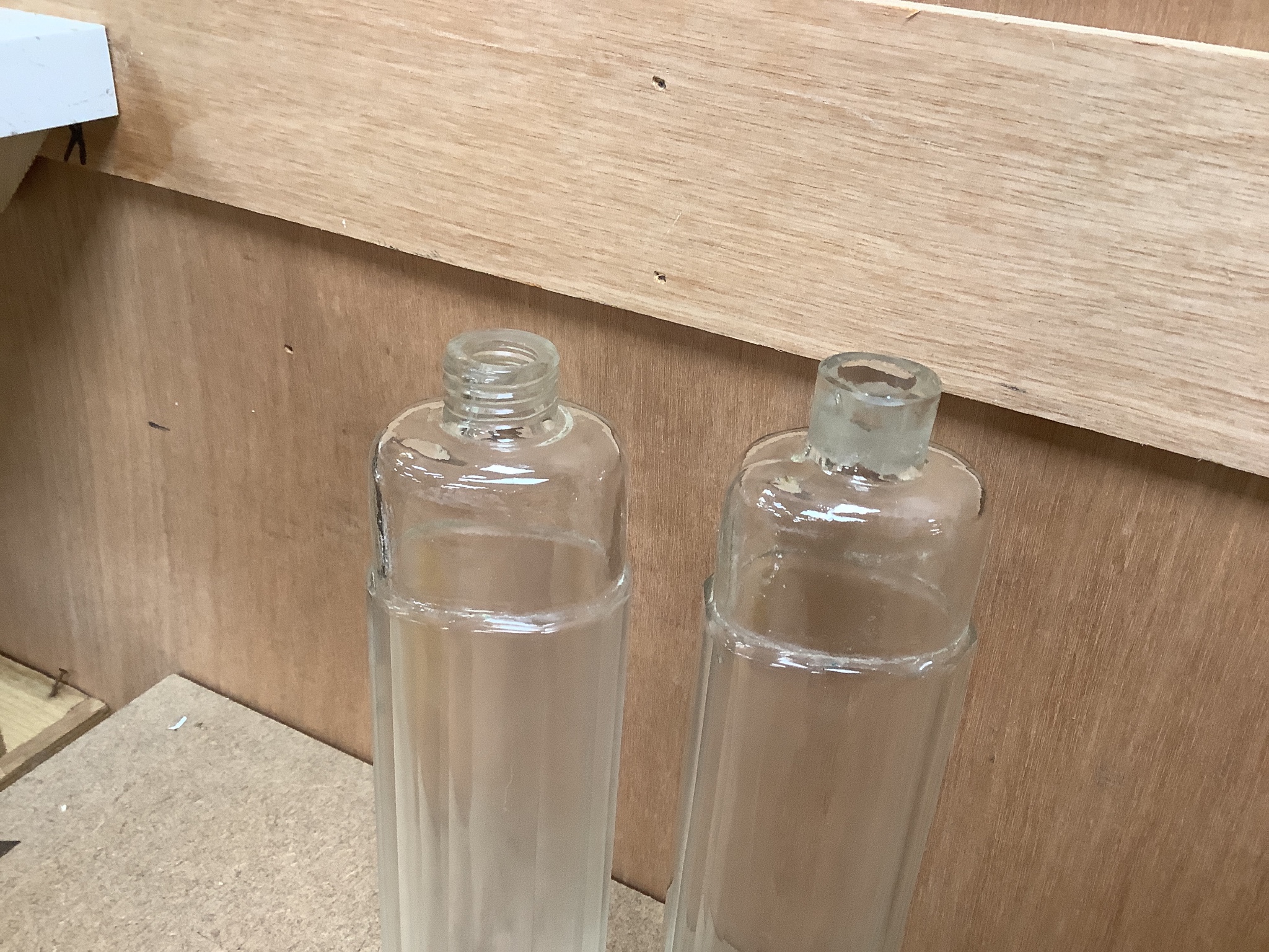 A late 19th/early 20th century leather duo travelling flask case by A. Greaves with two flasks